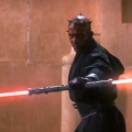 Darth Maul wielding his double light saber for the first time